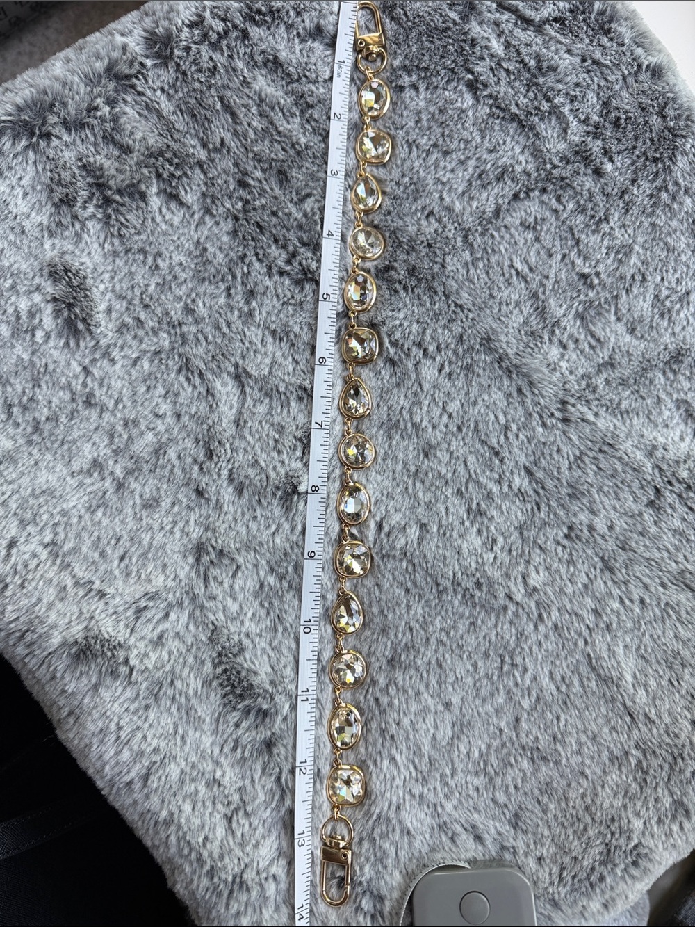 Gold toned Crystal Link purse chain.